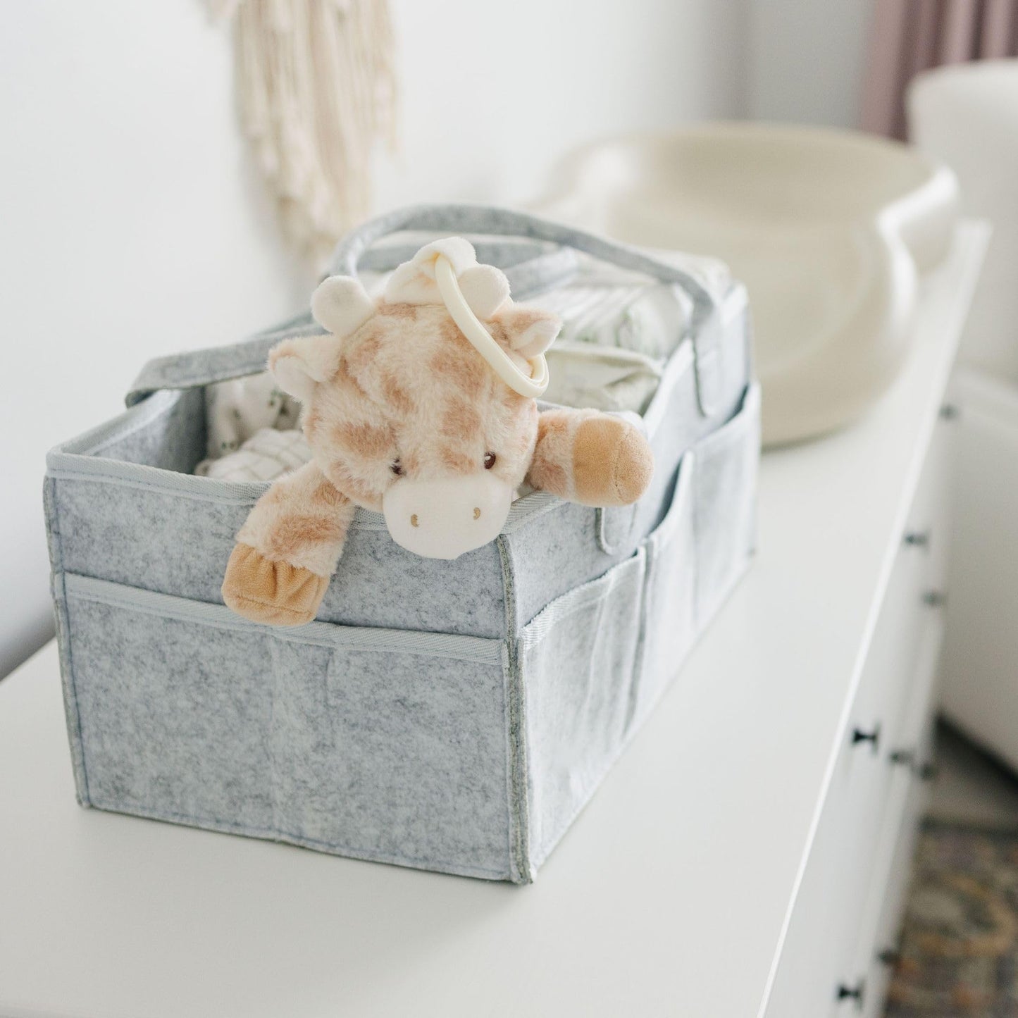 Storage basket for baby items, changing table & care with 8 outside pockets: Baby gift