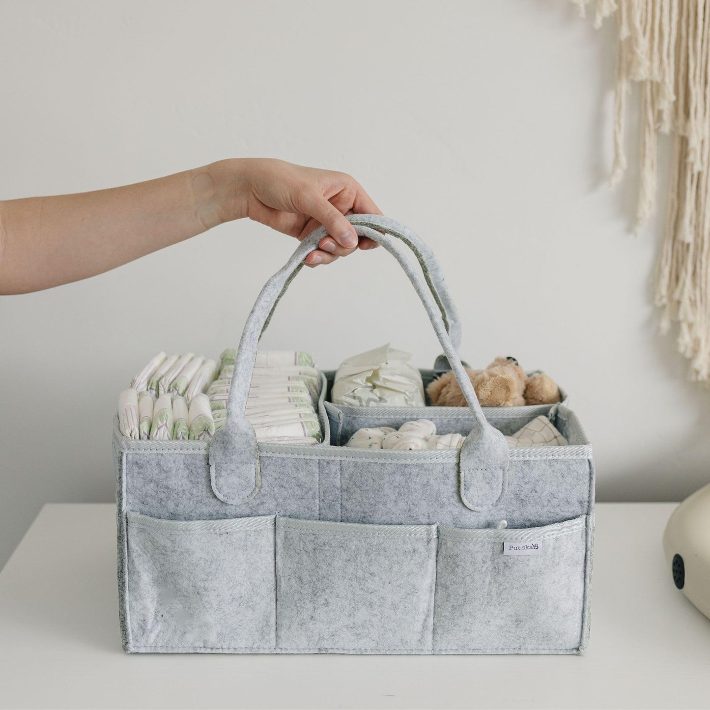 Storage basket for baby items, changing table & care with 8 outside pockets: Baby gift